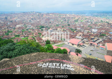 Aerial view of the city of Abeokuta, Nigeria, and a 'safety limit' warning marking, taken from Olumo rock Stock Photo