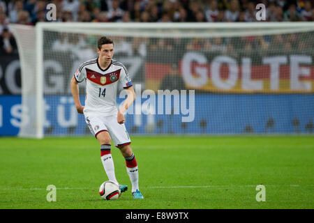 Gelsenkirchen, Germany. 14th Oct, 2014. Germany's Julian Draxler plays the ball during the UEFA EURO 2016 qualifying soccer match between Germany and Ireland at Arena Auf Schalke in Gelsenkirchen, Germany, 14 October 2014. Photo: Rolf Vennenbernd/dpa/Alamy Live News Stock Photo