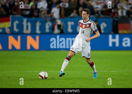 Gelsenkirchen, Germany. 14th Oct, 2014. Germany's Julian Draxler plays the ball during the UEFA EURO 2016 qualifying soccer match between Germany and Ireland at Arena Auf Schalke in Gelsenkirchen, Germany, 14 October 2014. Photo: Rolf Vennenbernd/dpa/Alamy Live News Stock Photo