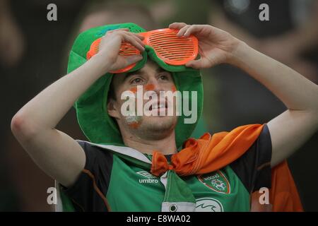 Gelsenkirchen, Germany. 14th Oct, 2014. A supporter of Ireland looks on prior to the UEFA EURO 2016 qualifying soccer match between Germany and Ireland at Arena Auf Schalke in Gelsenkirchen, Germany, 14 October 2014. Photo: Fredrik von Erichsen/dpa/Alamy Live News Stock Photo