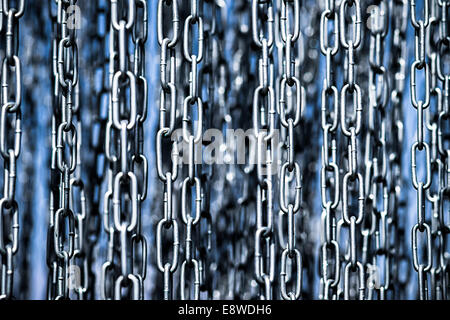 Links. Closeup view of freely hanging metal chains Stock Photo