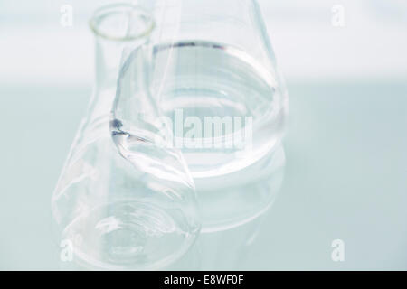 Close up of empty beakers on counter in lab Stock Photo