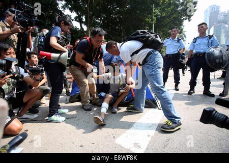 Hong Kong. 14th Oct, 2014. The 17th day of occupy central, polices are cleaning the roadblocks and drive protesters in Hongkong, China on 14th October, 2014 Credit:  Top Photo Corporation/Alamy Live News Stock Photo