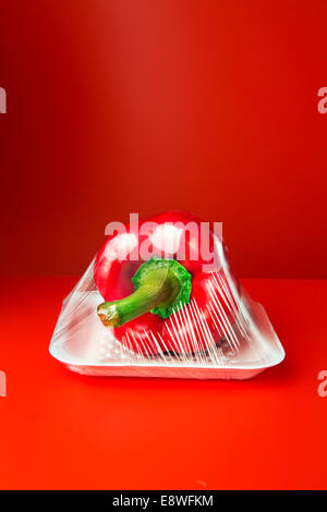 Close up of bell pepper shrink wrapped in plastic Stock Photo