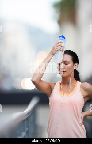 Woman resting after exercise Stock Photo