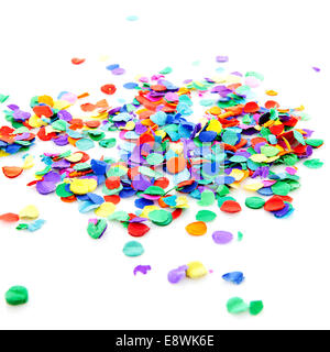 pile of colorful confetti over white background Stock Photo - Alamy