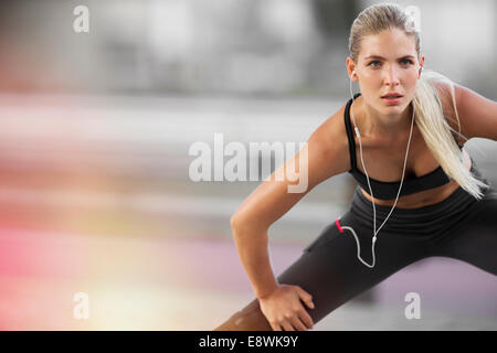 Woman stretching before exercising Stock Photo