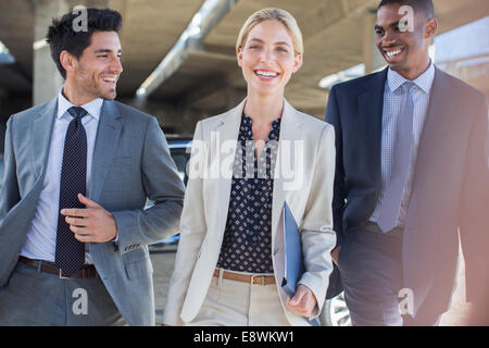Business people walking together Stock Photo