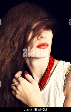 Portrait of young beautiful long-haired woman Stock Photo