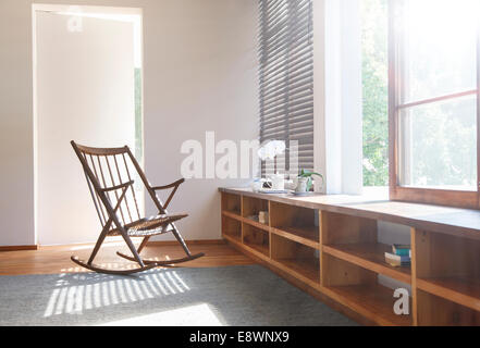 Rocking chair and rug in modern bedroom Stock Photo