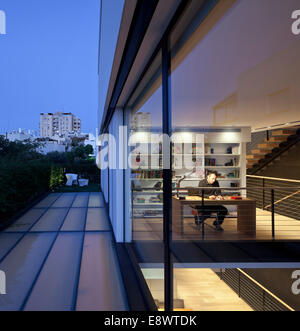 Man sitting at desk in of R House, Israel, Middle East. Stock Photo