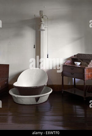 Antique bathtub in La Maison Creole a French colonial house, Eureka house, House of 109 doors in Moka, Mauritius.