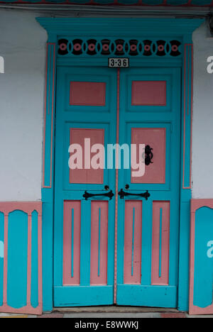 Painted doorway in the town of Salento, in the coffee growing region, Colombia Stock Photo