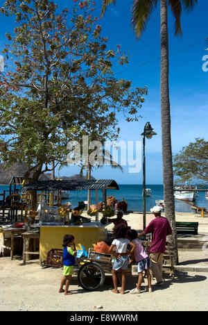 Locals at the fishing village of Taganga, along the Caribbean coast, Colombia Stock Photo