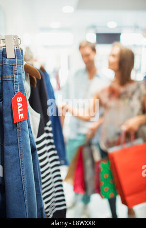 Close up of sale tag on clothes in store Stock Photo