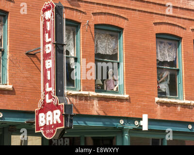 Wild Bill Bar Neon Sign, Historic Main Street in Deadwood, South Dakota, USA Stock Photo