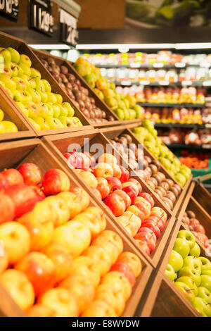 Close up of fruit in produce section of grocery store Stock Photo