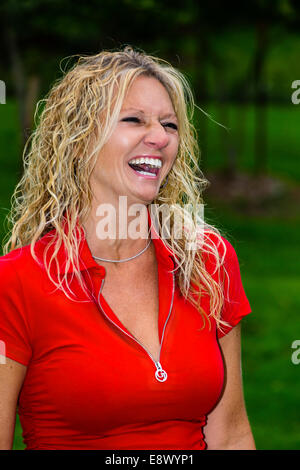Female model in casual clothing laughing Stock Photo