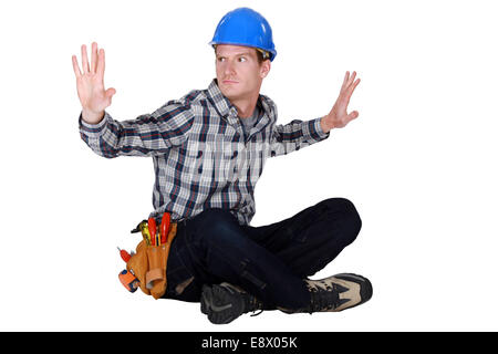 Laborer gesturing Stock Photo