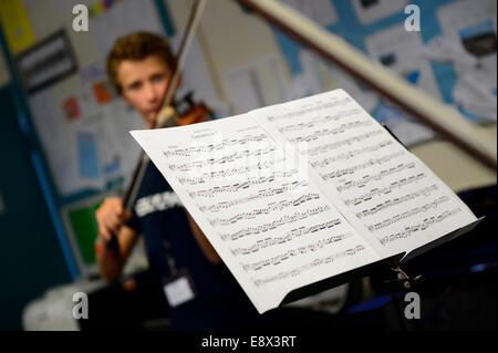 Young teenage musicians rehearsing violin playing class workshop lesson at Aberystwyth MusicFest 2014 Stock Photo