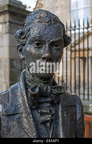 Statue in memory of the Scottish poet Robert Fergusson (1750-74) outside Canongate Kirk in Edinburgh. Stock Photo