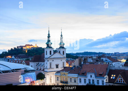 Overview at dusk with illuminated Dominican church and Spilberk castle. Brno, Czech Republic Stock Photo