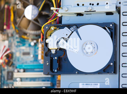 A close-up of hard disk data storage drive in a PC home computer from 2007 Stock Photo