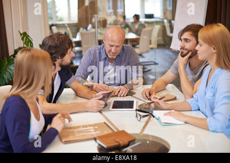 Group of creative business people having meeting in office Stock Photo
