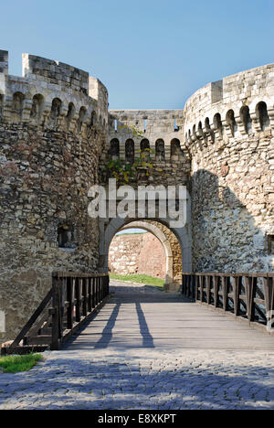 Stone walls and gate with wooden bridge of medieval fortress Stock ...