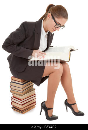 Young woman with a books pile Stock Photo - Alamy