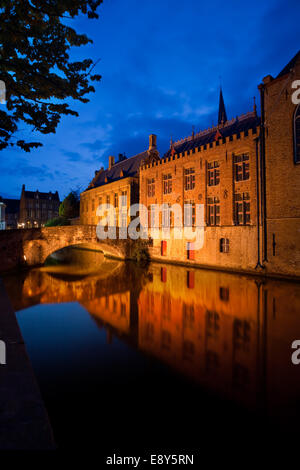 Bruges buildings reflected in canal Stock Photo