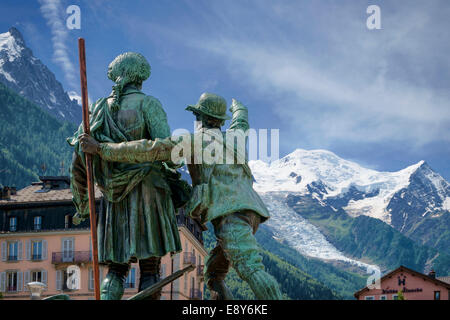 Statue of climbers Horace-Benedict de Saussure and Jacques Balmat (R) pointing to Mont Blanc in Chamonix, French Alps, France Stock Photo