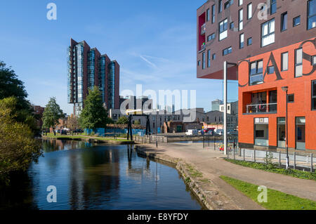 Islington Wharf and the Chips (at right) apartment blocks from the Ashton canal, New Islington, Ancoats, Manchester, England, UK Stock Photo