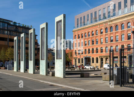 Artworks by Dan Dubowitz and the Ice Plant building at Cutting Room Square, Ancoats, Manchester, England, UK Stock Photo