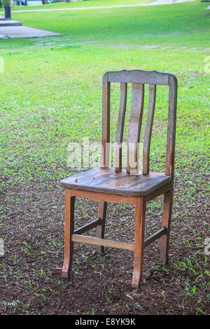 chair on grass in the garden in summer Stock Photo