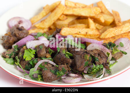 Albanian Liver, a traditional Turkish spiced lamb's liver recipe popular throughout the Middle East, with french fried chips Stock Photo