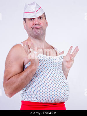 jovial cook in a undershirt Stock Photo