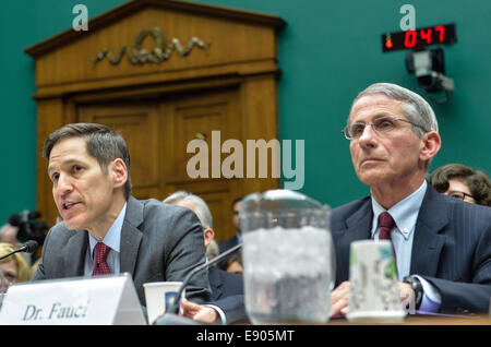 Washington, DC, USA. 16th October, 2014. Tom Frieden(L), the director of the U.S. Centers for Disease Control and Prevention (CDC) testifies during a hearing on Examining the U.S. Public Health Response to the Ebola Outbreak before the Oversight and Investigations Subcommittee at Capitol Hill in Washington, DC, capital of the United States, Oct. 16, 2014. Credit:  Xinhua/Alamy Live News Stock Photo