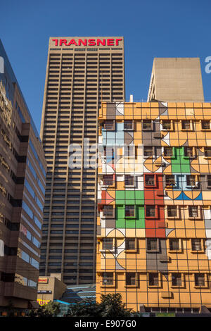 JOHANNESBURG, SOUTH AFRICA - Fanuel Motsepe's colorfully painted building, corner of Fox and Von Brandis Streets, downtown. Stock Photo