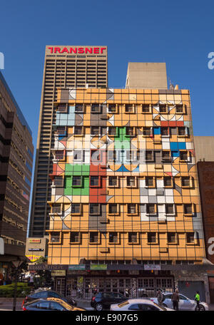 JOHANNESBURG, SOUTH AFRICA - Fanuel Motsepe's colorfully painted building, corner of Fox and Von Brandis Streets, downtown. Stock Photo