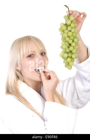 Young Woman with grapes Stock Photo