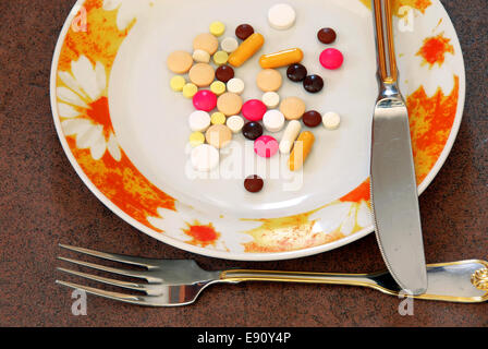 Pills on plate Stock Photo