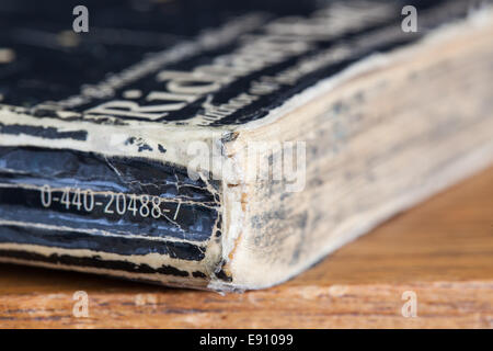 Detail of the headcap of an old paperback book Stock Photo