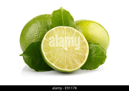 Ripe lime fruits with green leaves isolated Stock Photo