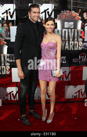 The 23rd Annual MTV Movie Awards at Nokia Theatre on April 13, 2014 in Los Angeles, California.  Featuring: Victoria Justice,Ryan Rottman Where: Los Angeles, California, United States When: 14 Apr 2014 Stock Photo