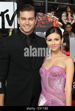 The 23rd Annual MTV Movie Awards at Nokia Theatre on April 13, 2014 in Los Angeles, California.  Featuring: Victoria Justice,Ryan Rottman Where: Los Angeles, California, United States When: 14 Apr 2014 Stock Photo