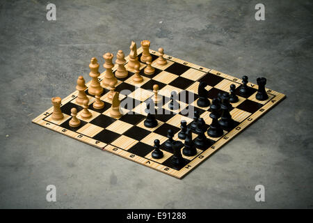 chess board on a cement floor Stock Photo