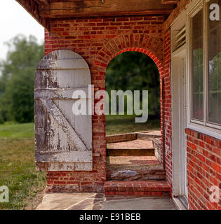 Door in derelict red barn. Achnashellach Estate, Ross and 