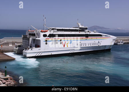 Tarifa Spain a Virtu Ferries ferry boat arrives docks at Tarifa harbour port Stock Photo