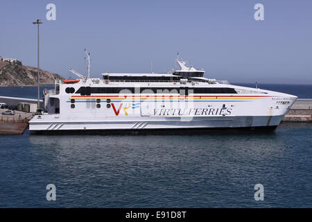 Tarifa Spain harbour port a Virtu Ferries ferry boat  used on passenger services from Spain to Morocco North Africa Stock Photo